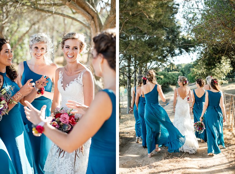 Tammy walks down the farm road with her bridesmaids