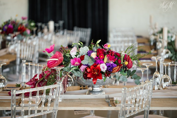 Colourful wedding table decor at The Rose Barn