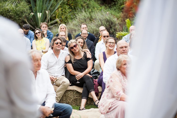 Wedding guests sip Hillock sparkling wine during the Karoo wedding ceremony